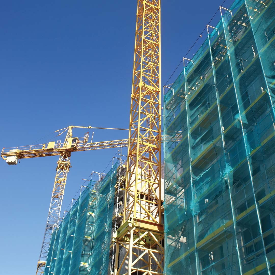 green netting debris around a building