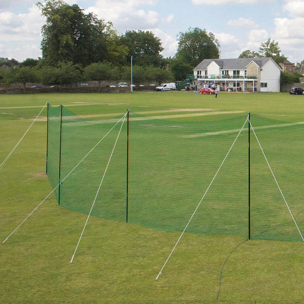 cricket ball stop net attached to grass