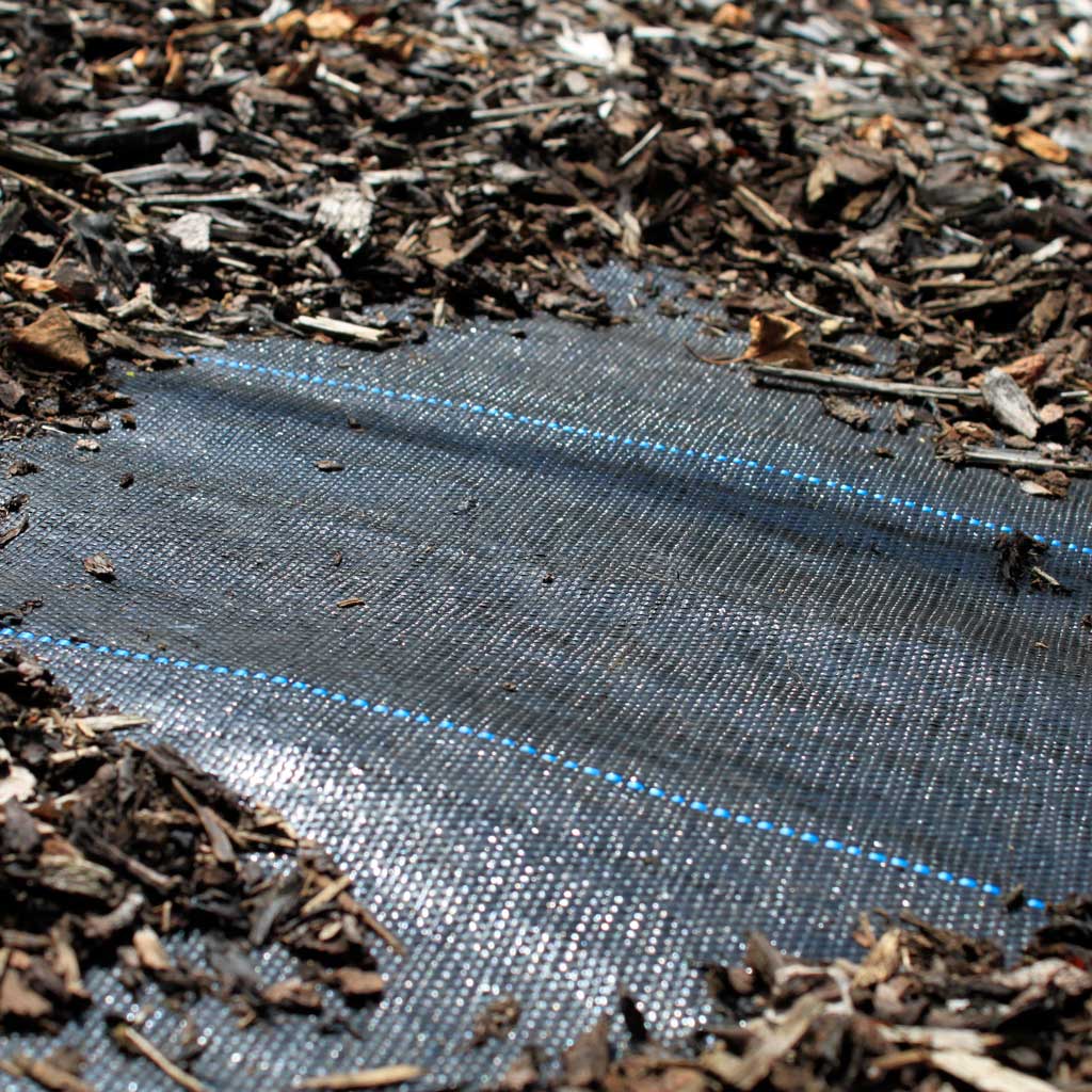 garden membrane with bark chippings on top