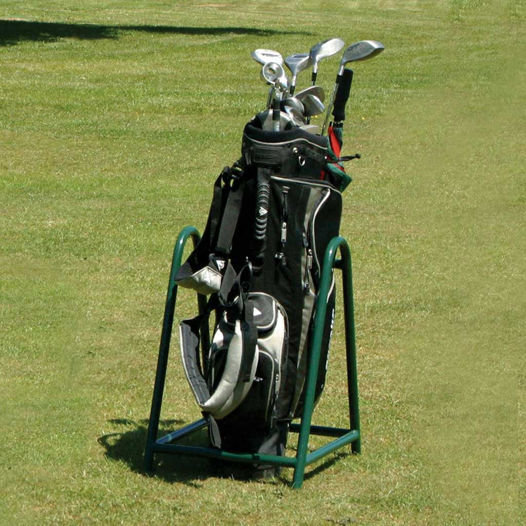 golf stand with golf clubs on grass