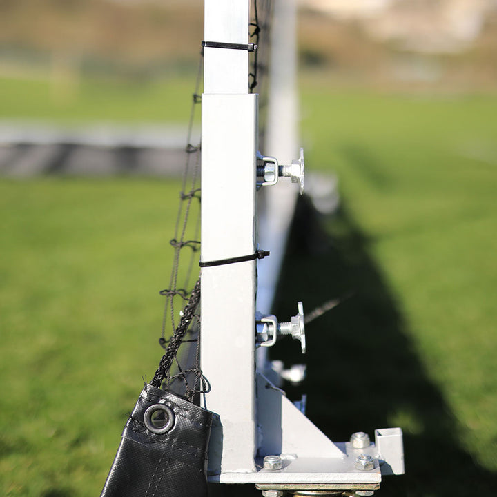 cable ties connecting net and pole on mobile cricket cage