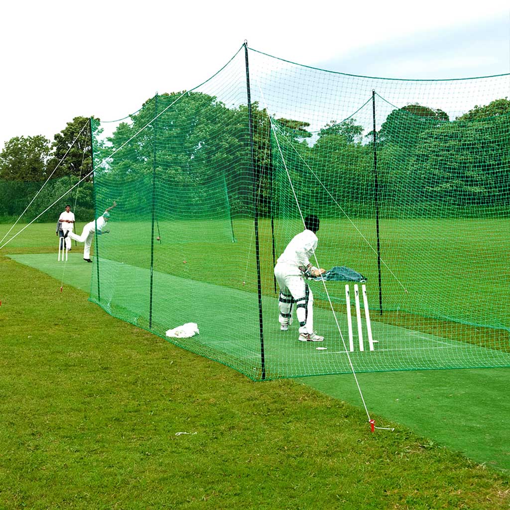 portanets in use by cricketers on playing field