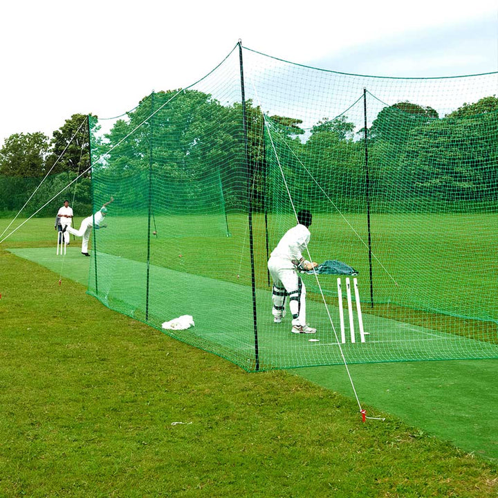 portanets in use by cricketers on playing field