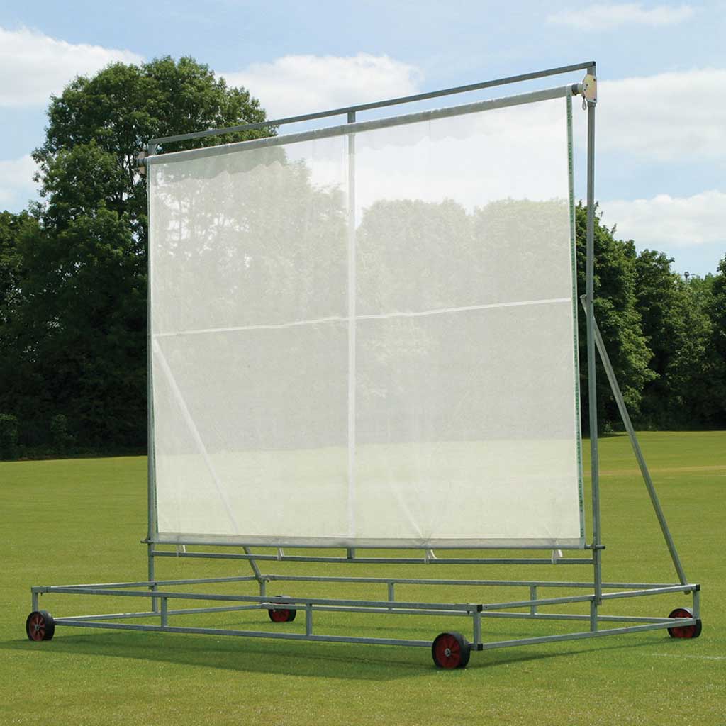 screen attached to a metal frame on grass with trees in the background