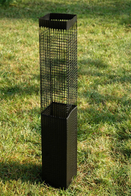 Tildenet Spray Guard in black freestanding on a patch of grass.